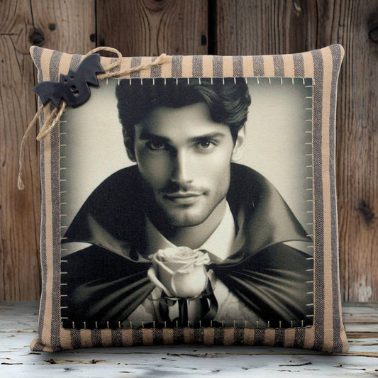 Decorative pillow with a portrait of a  handsome young vampire holding a rose on a white background