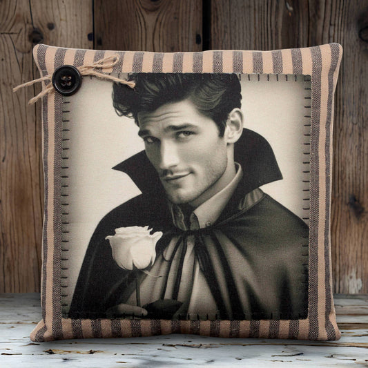 Mini pillow with an image of a handsome young male vampire for Halloween decorating