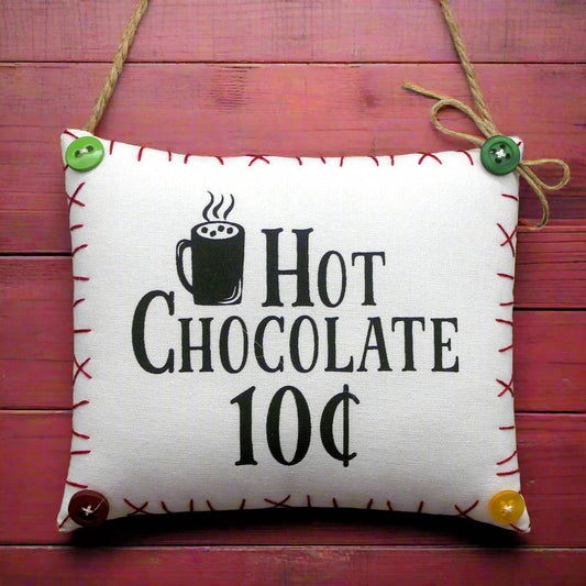Decorative fabric sign with 'Hot Chocolate 10c' text and mug icon