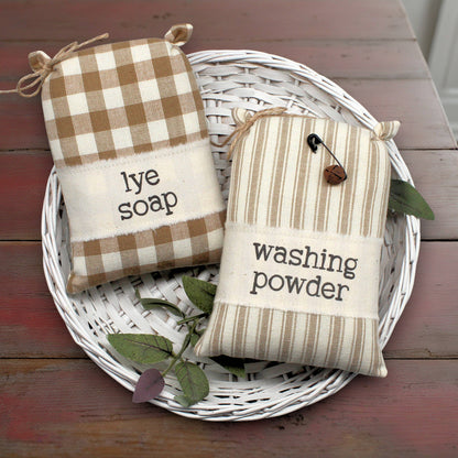 Set of two mini feedsack style bowl fillers with washing powder and lye soap labels for decorating a laundry room