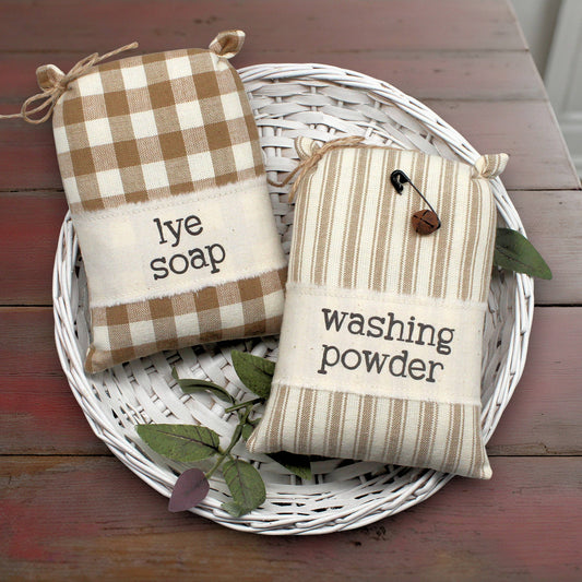 Set of two mini feedsack style bowl fillers with washing powder and lye soap labels for decorating a laundry room