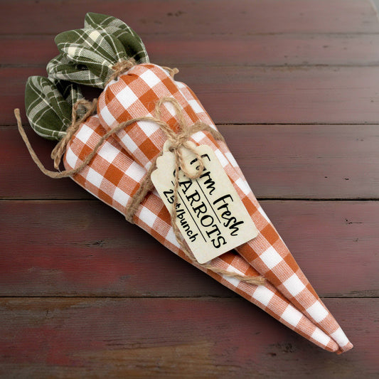 Bundle of orange and white checked homespun fabric carrots
