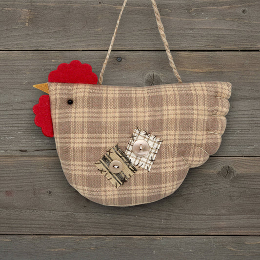 Plaid chicken ornament with decorative elements on a wooden background