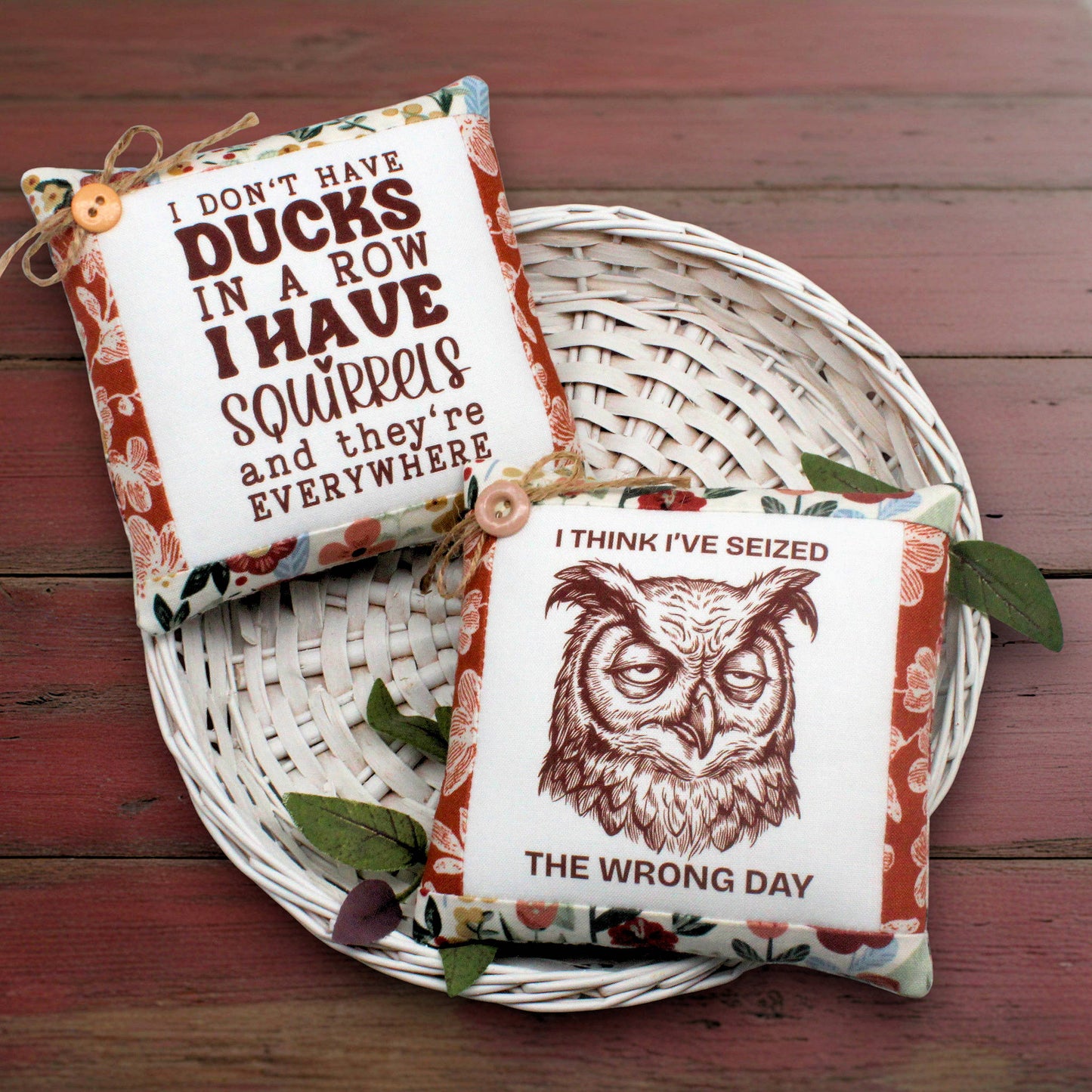 Set of two mini pillow bowl fillers with a weary owl and a squad of squirrels who won't get into a row