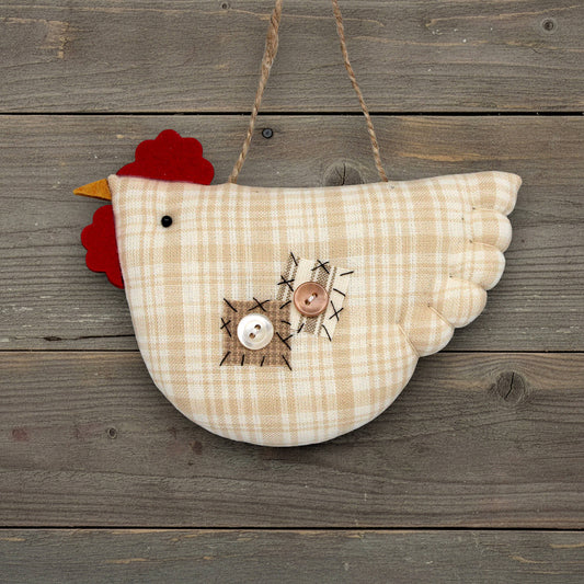 Decorative chicken ornament on a wooden background
