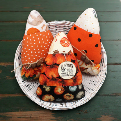 Set of three colorful fabric candy corn autumn bowl fillers