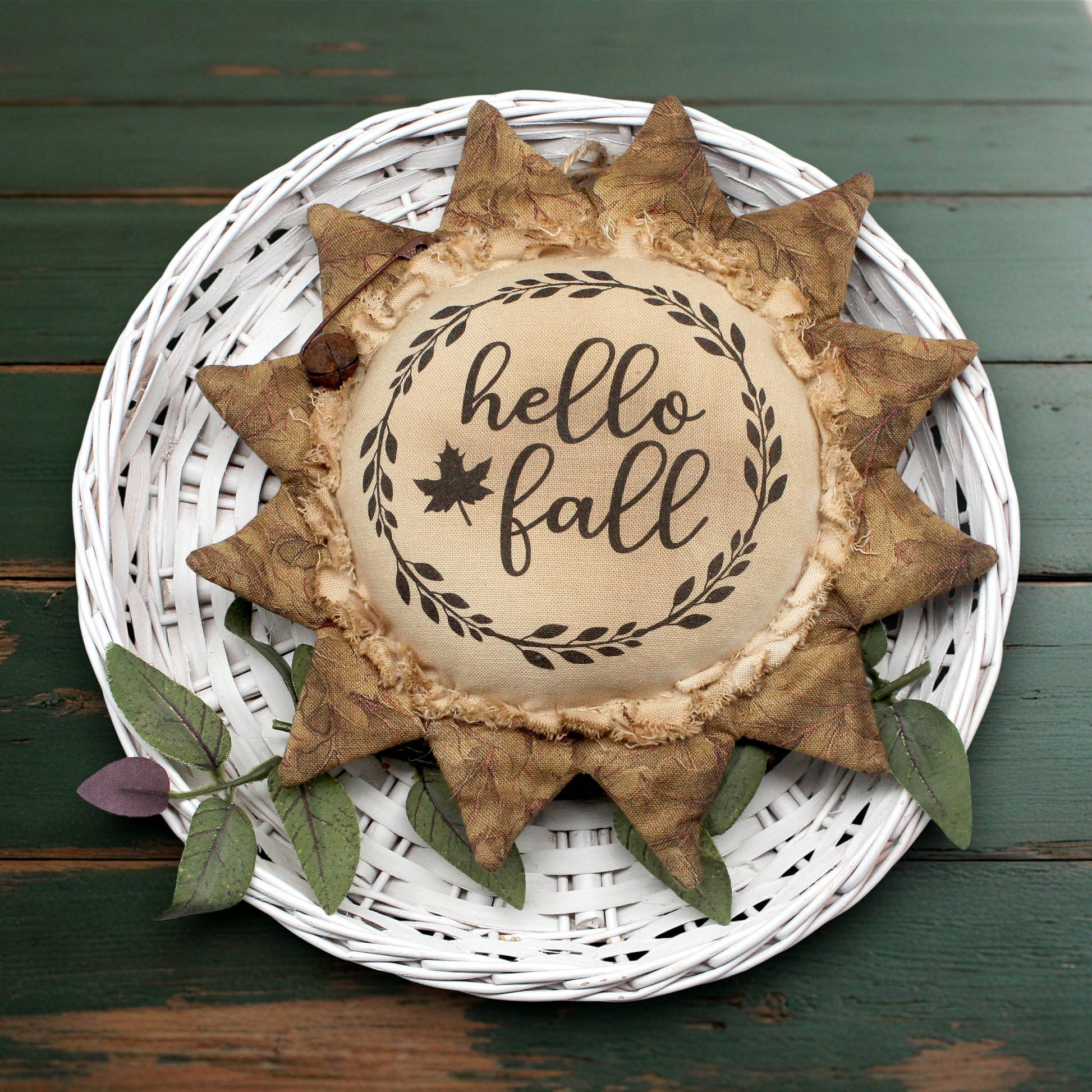 Primitive sunflower ornament with the greeting Hello Fall