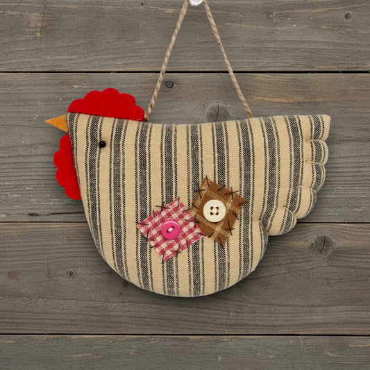 Decorative chicken ornament with striped pattern and buttons on a wooden background