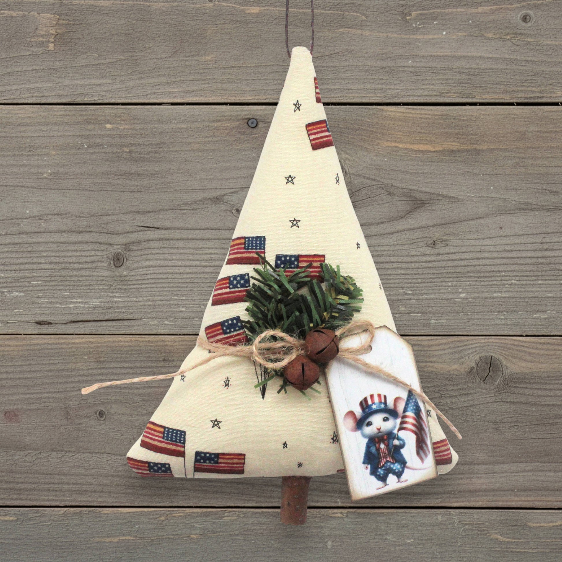 Handmade tree-shaped Christmas ornament with American flags and stars