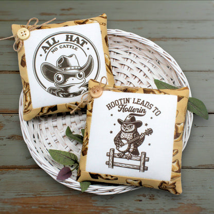Set of two mini pillow bowl fillers featuring a frog in a Stetson hat and an banjo-playing owl